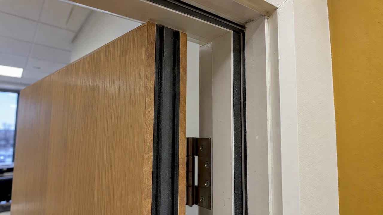 Intumescent and smoke seals on a fire door